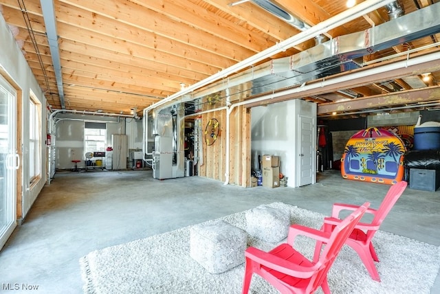 basement featuring heating unit