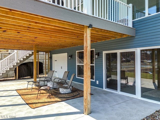 view of patio featuring stairs