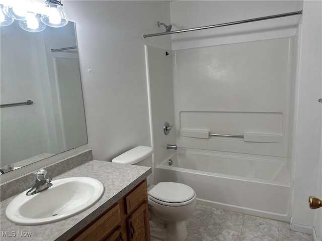 bathroom with shower / bathing tub combination, toilet, and vanity