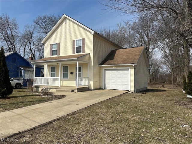 traditional-style house with driveway, covered porch, and an attached garage