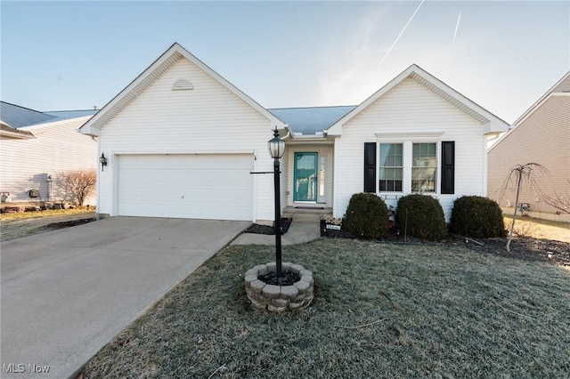 ranch-style house featuring driveway, an attached garage, and a front yard