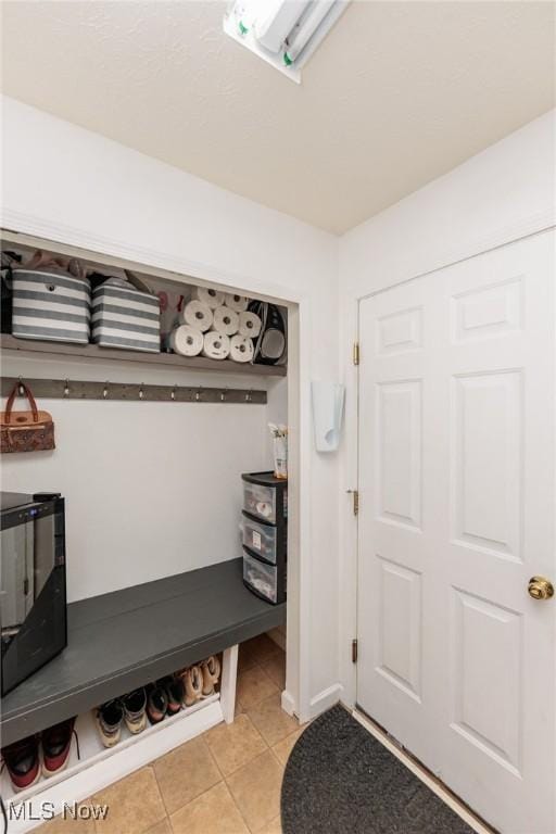 mudroom featuring light tile patterned floors