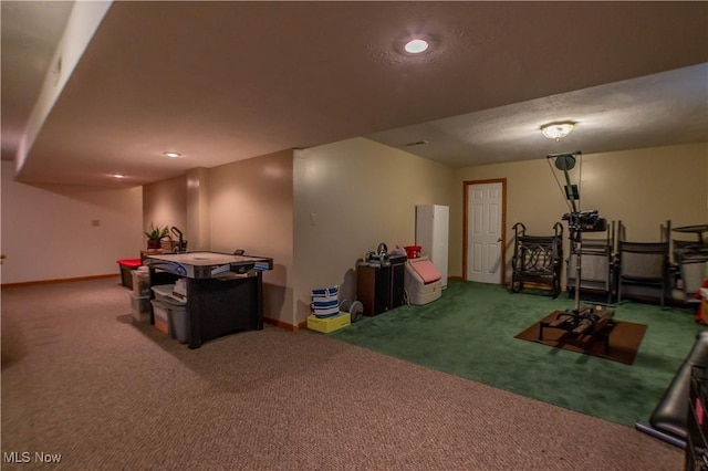 interior space featuring carpet flooring and baseboards