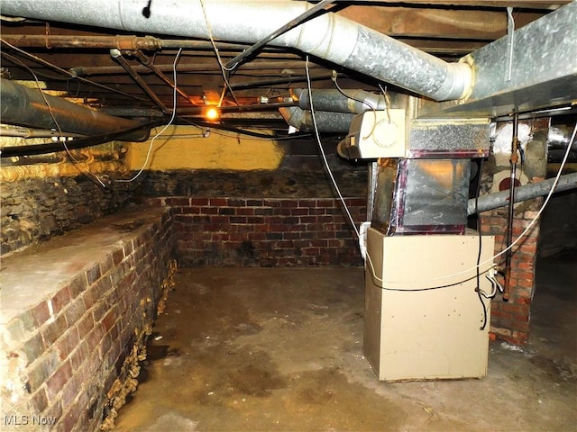 unfinished basement with heating unit