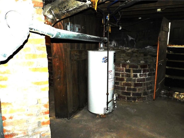 utility room with gas water heater