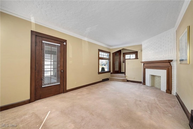 unfurnished living room with crown molding, carpet, and baseboards