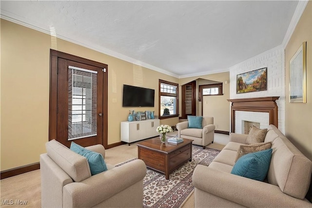 living room with crown molding, a brick fireplace, baseboards, and light carpet