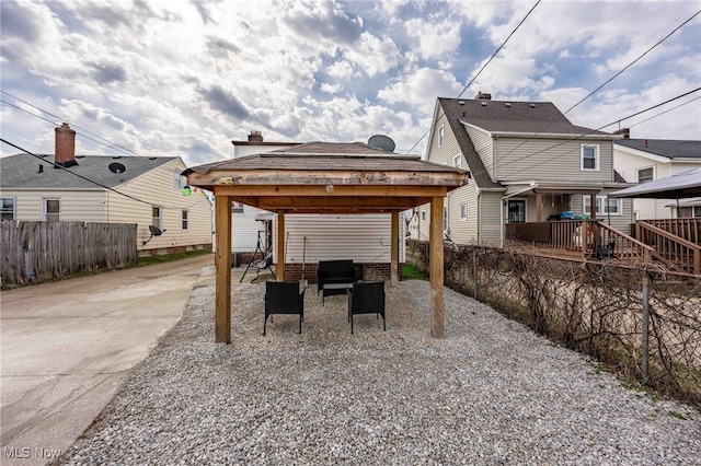 view of patio / terrace featuring a gazebo and fence