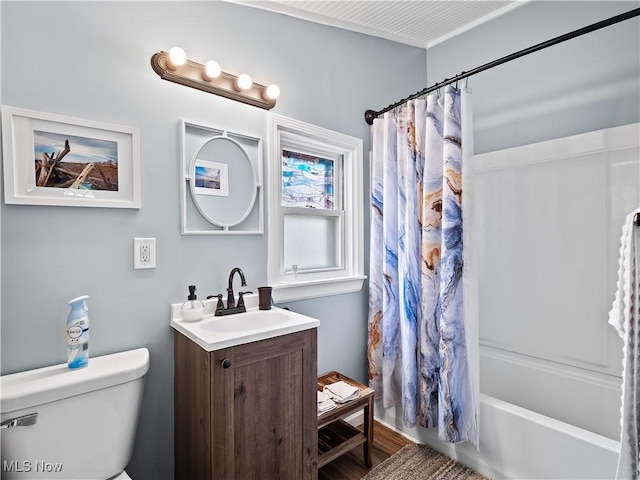 full bathroom featuring toilet, vanity, and shower / bath combo