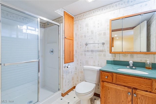 bathroom with wallpapered walls, a shower stall, toilet, and vanity