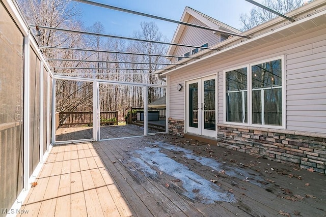 wooden terrace featuring french doors