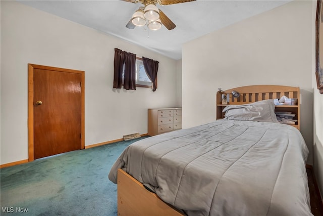 bedroom with a ceiling fan, baseboards, and carpet floors