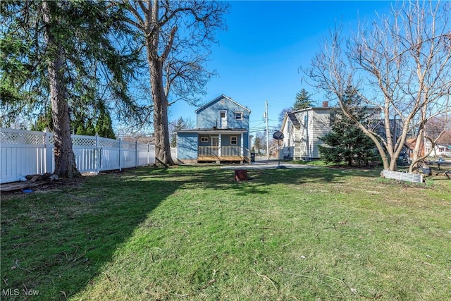 view of yard featuring fence