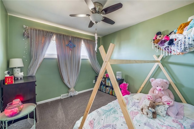 carpeted bedroom featuring visible vents, ceiling fan, and baseboards