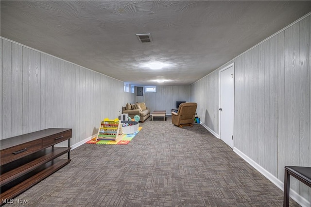 rec room featuring carpet, visible vents, and baseboards