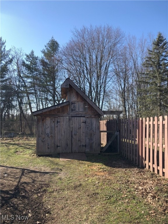 view of outdoor structure with an outdoor structure and fence