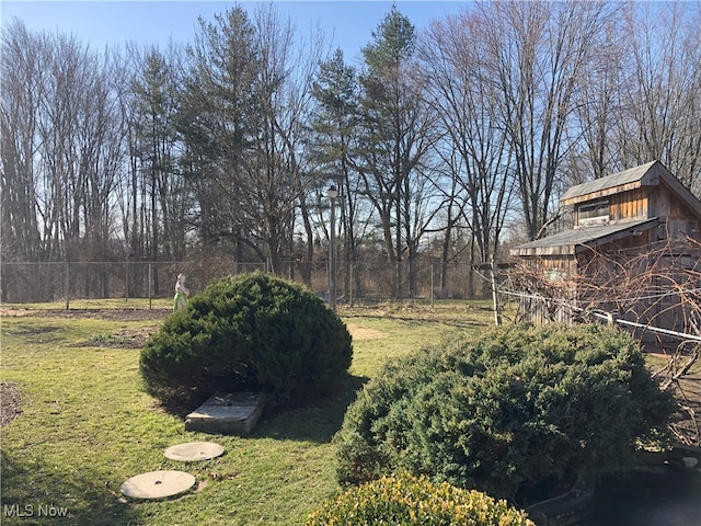 view of yard with fence