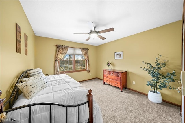 bedroom featuring baseboards, carpet, and a ceiling fan