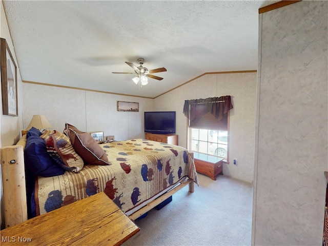 carpeted bedroom featuring a textured ceiling, crown molding, ceiling fan, and vaulted ceiling