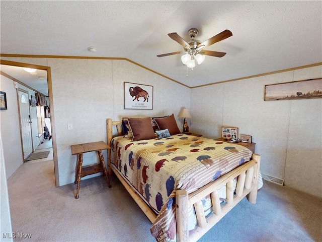 bedroom featuring crown molding, ceiling fan, lofted ceiling, light carpet, and a textured ceiling