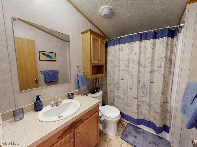 bathroom with a shower with shower curtain, toilet, a textured ceiling, and vanity