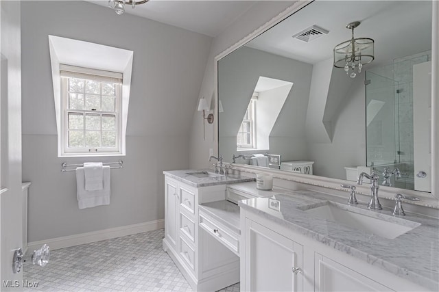 full bath featuring a healthy amount of sunlight, visible vents, and a sink