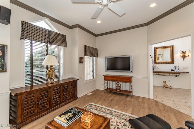 living room featuring wood finished floors, a ceiling fan, baseboards, recessed lighting, and ornamental molding