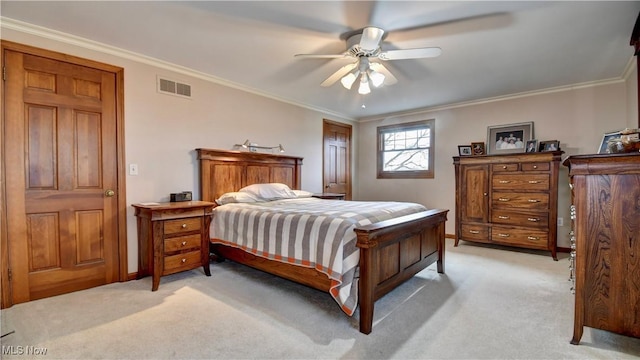 bedroom with a ceiling fan, crown molding, light colored carpet, and visible vents