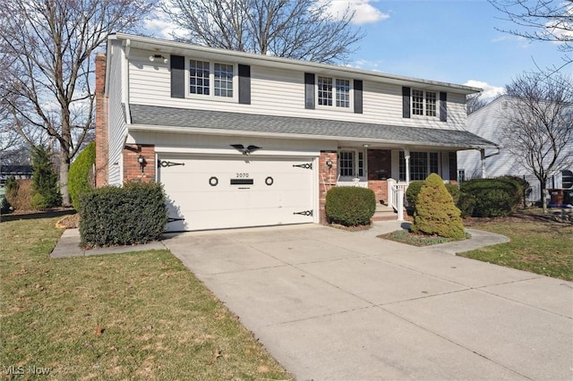 traditional-style house featuring concrete driveway, an attached garage, covered porch, and brick siding