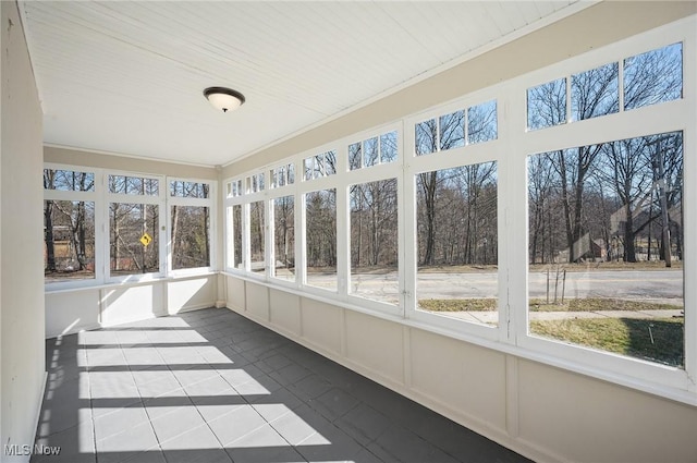 unfurnished sunroom with a healthy amount of sunlight