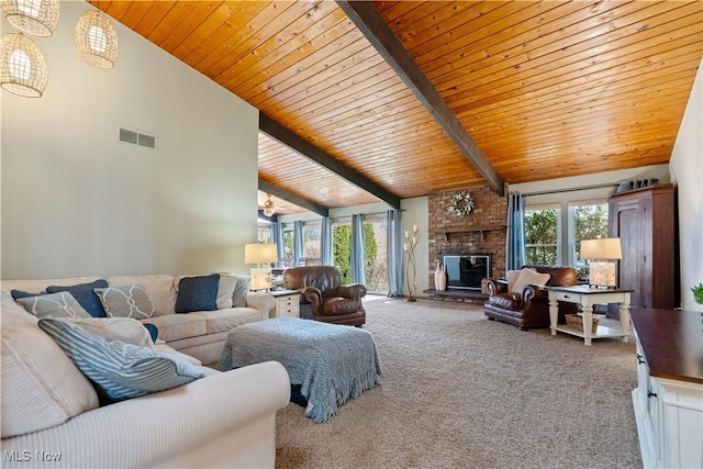 living room featuring a wealth of natural light, visible vents, high vaulted ceiling, and carpet flooring