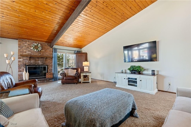 carpeted living area with baseboards, high vaulted ceiling, beam ceiling, wooden ceiling, and a brick fireplace