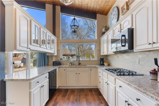 kitchen featuring a sink, light stone counters, wood ceiling, dishwasher, and stainless steel gas cooktop