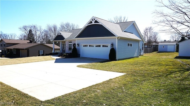 view of property exterior featuring driveway, an attached garage, an outdoor structure, a lawn, and board and batten siding