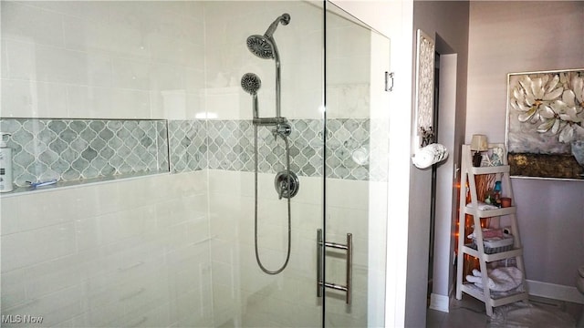 bathroom with tiled shower