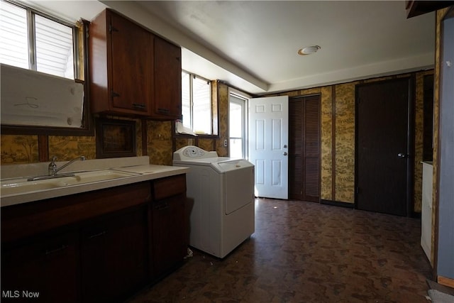 4286 W 152nd St, Cleveland, OH 44135 - washroom featuring washer / dryer, cabinet space, and a sink