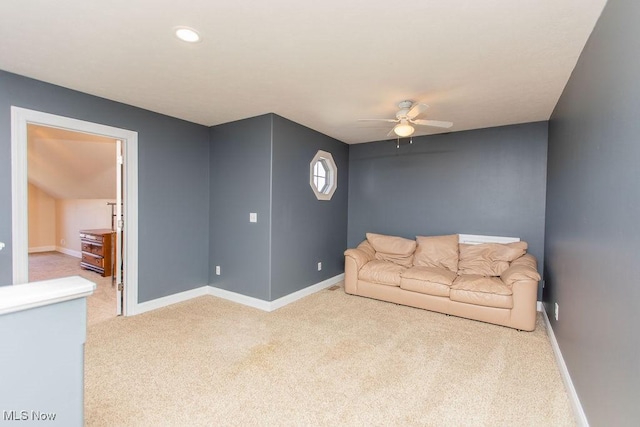 living area with recessed lighting, baseboards, light carpet, and a ceiling fan