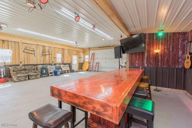 dining space with concrete floors