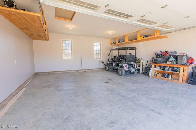 garage with baseboards