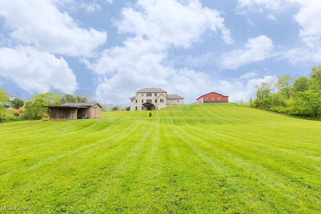6603 Congress Rd, Spencer, OH 44275 - view of green lawn with a pole building and an outdoor structure