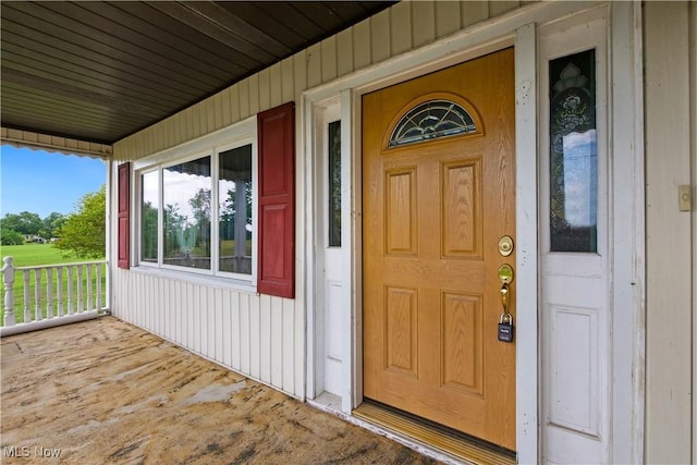 property entrance with a porch