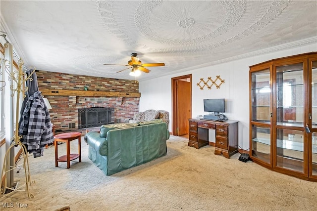 carpeted living room featuring ceiling fan, a brick fireplace, and a textured ceiling