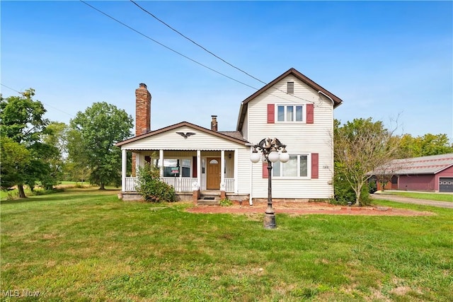 view of front of house featuring a porch, a front lawn, and a chimney