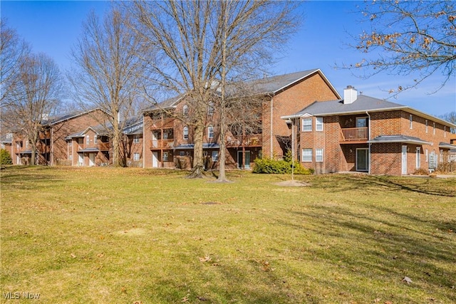 exterior space featuring a balcony