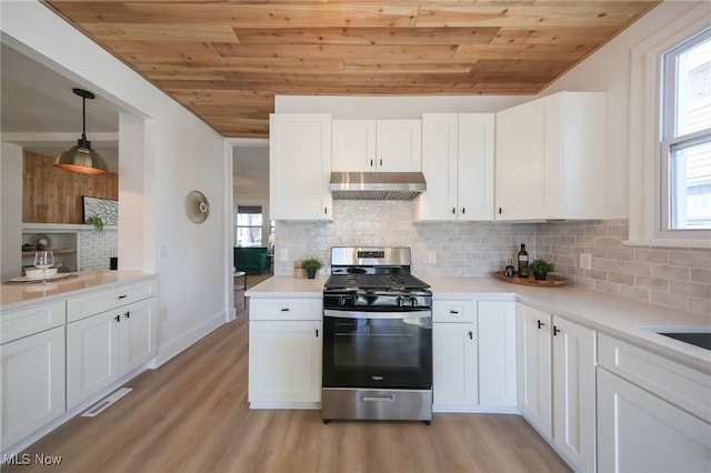 kitchen featuring under cabinet range hood, gas range, wooden ceiling, and light wood-type flooring