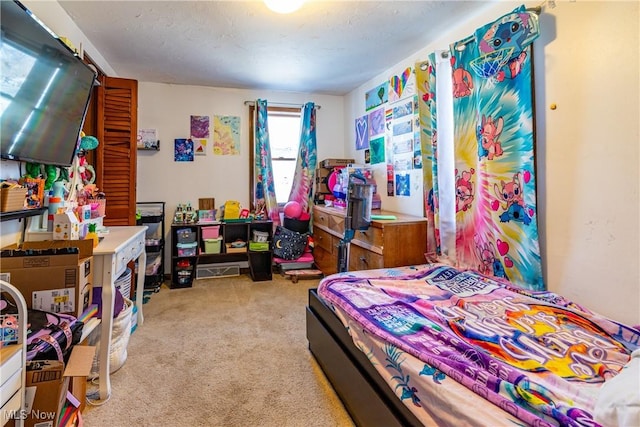 bedroom featuring carpet flooring