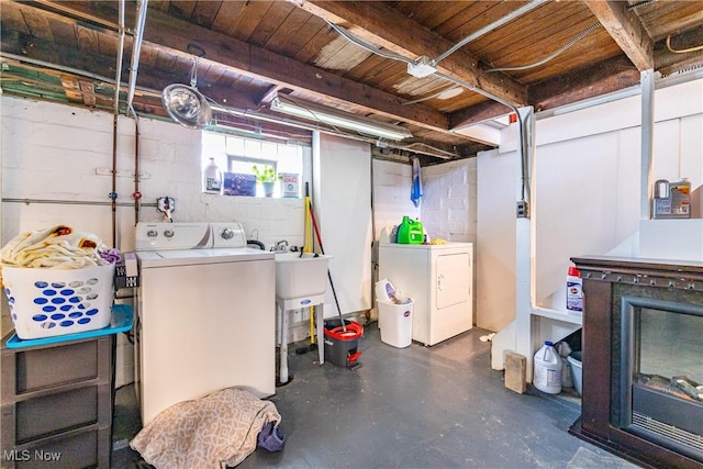 basement with washer and clothes dryer