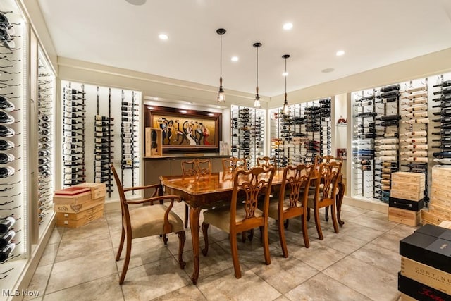 wine area featuring light tile patterned flooring and recessed lighting