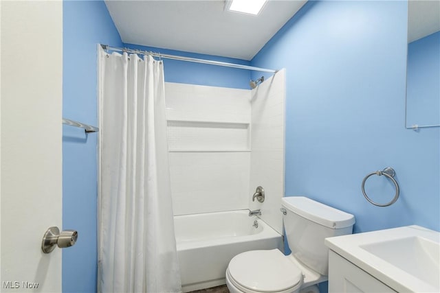 full bath featuring toilet, vanity, and shower / bath combo