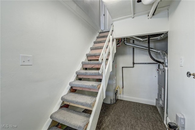 stairs with carpet and baseboards